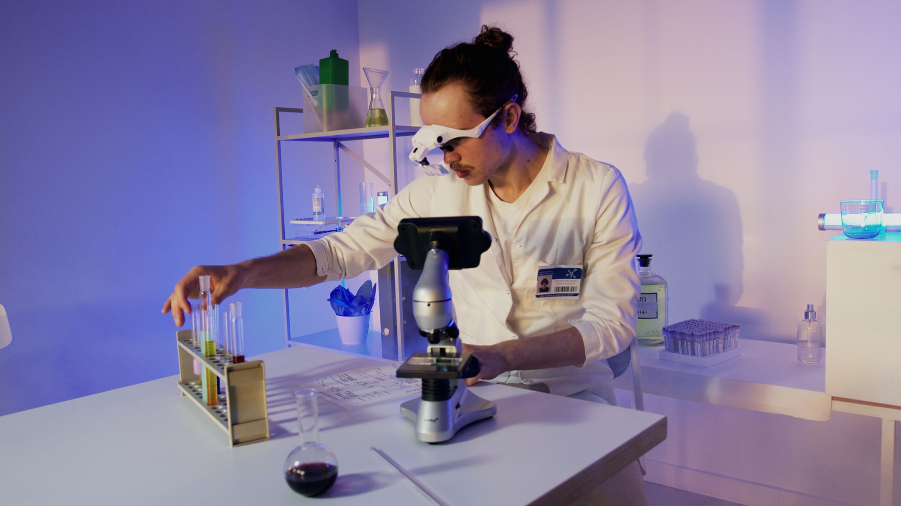 A scientist working at a bench